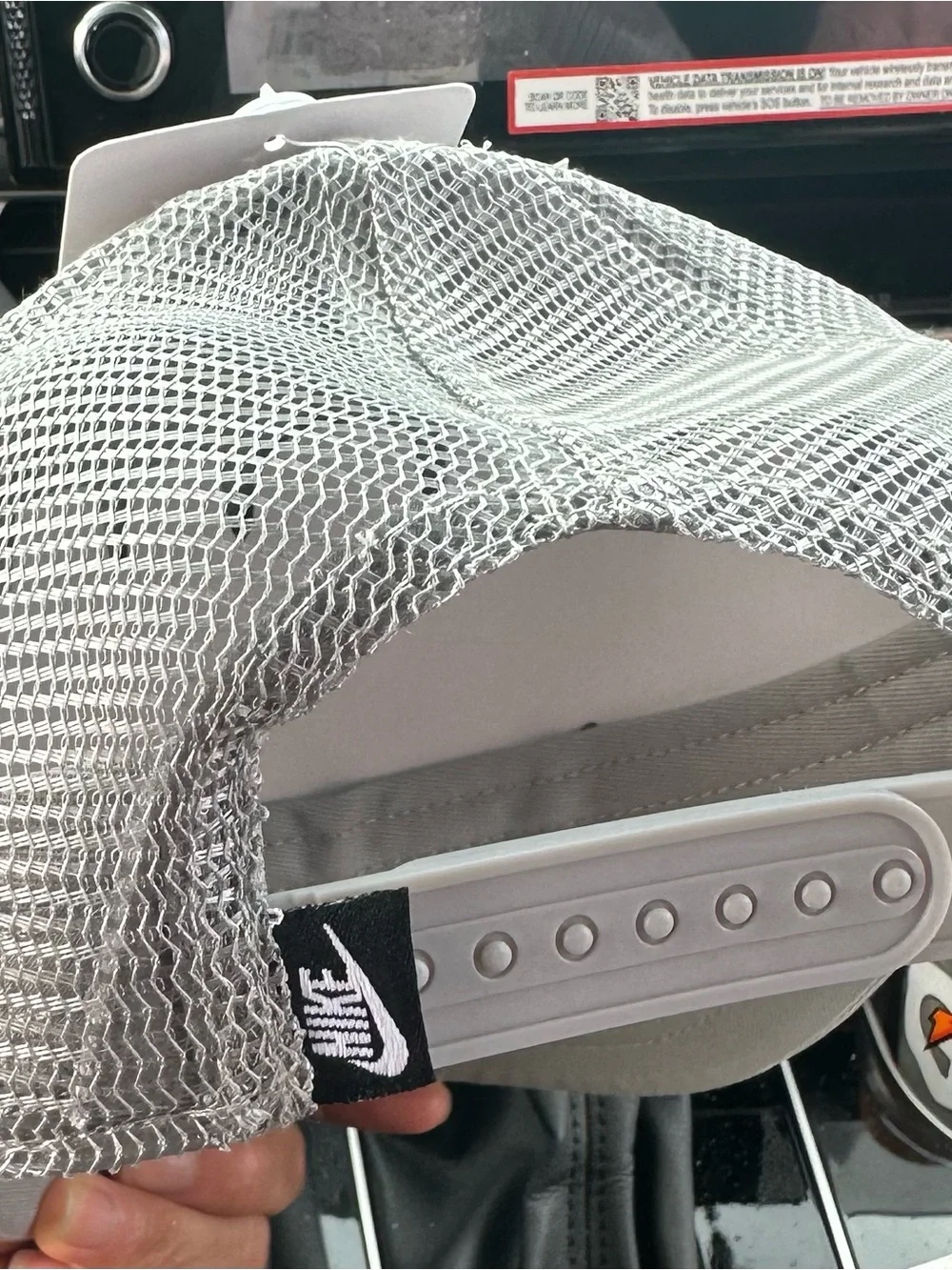 Nike Silver Mesh Trucker Hat with Black Logo Tag